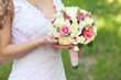 Bride with bouquet, closeup Bride with bouquet, closeup