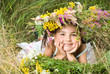 Girl lying on grass and smiling