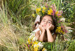 Girl lying on grass and smiling