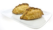 Traditional Cornish Pasties on white background Traditional Cornish Pasties on white background