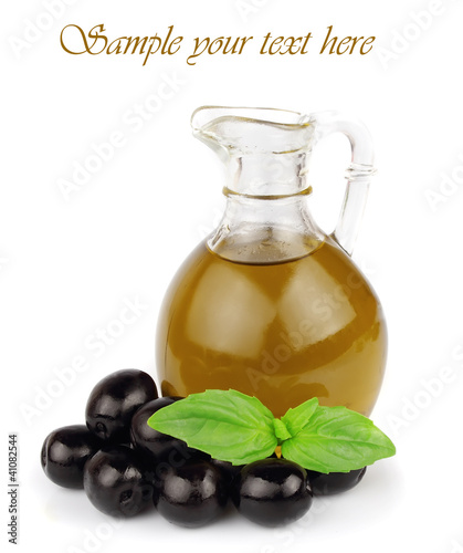 Photo: Loive oil with basil on white Loive oil with basil on white