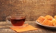 Afternoon tea served with a gourmet cupcake Afternoon tea served with a gourmet cupcake