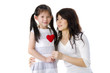 Photo of Asian mother and daughter on white background