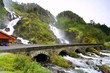 Beautiful waterfall scenery with old bridge