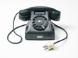 Foto: old green phone on white background - vecchio telefono a rotella old green phone on white background - vecchio telefono a rotella