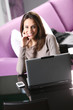 Photo: young woman working on her laptop young woman working on her laptop