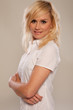 Beautiful blonde nurse with arms folded