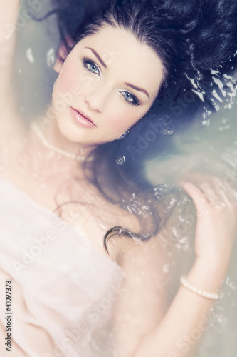 Photo: Beautiful woman in water Beautiful woman in water