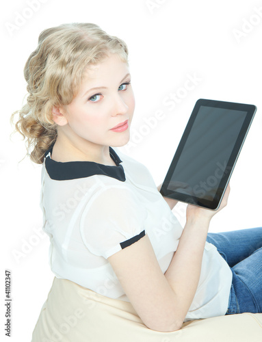 Photo: picture of happy teenege girl with tablet pc computer picture of happy teenege girl with tablet pc computer