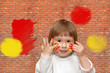Brick wall. The soiled child