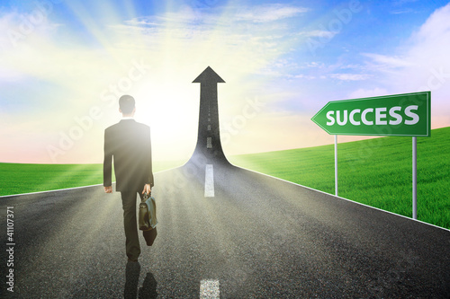Photo: Successful Businessman walking outdoor Successful Businessman walking outdoor