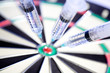 Syringes stuck in a dartboard