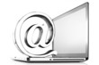 At symbol paper weight with laptop computer