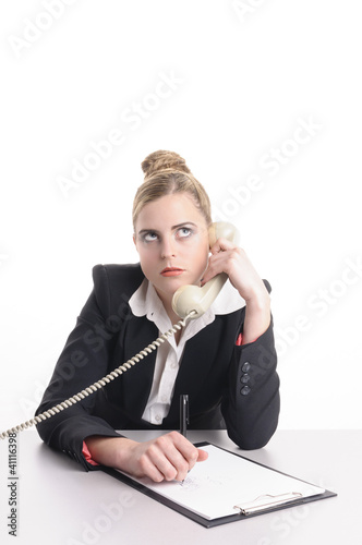 Foto: Geschäftsfrau hat Ärger am Telefon Geschäftsfrau hat Ärger am Telefon