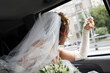 Photo: Bride in car Bride in car