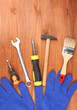 Set of tools and instruments on wooden background Set of tools and instruments on wooden background