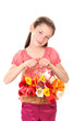 Portrait of beautiful little girl with tulips in basket Portrait of beautiful little girl with tulips in basket