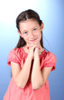 Portrait of beautiful little girl on blue background Portrait of beautiful little girl on blue background