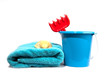 Bucket and towel with shell isolated on white Bucket and towel with shell isolated on white