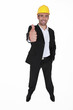 Happy architect giving the thumbs-up Happy architect giving the thumbs-up
