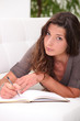 Woman writing in her journal