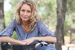 Blond woman on bike ride
