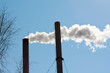 heating boiler chimney smoky in blue sky background