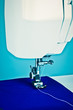 Sewing machine and thread toned in blue Sewing machine and thread toned in blue