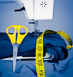 Sewing machine, measuring tape and scissors Sewing machine, measuring tape and scissors