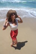 Beautiful young woman having fun at the sun
