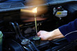 Photo: Mechanic repairing a car Mechanic repairing a car