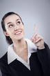 businesswoman pointing at copyspace