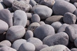 Photo: lot of peebles on a beach lot of peebles on a beach