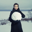Woman with snow ball