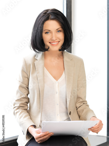 Photo: happy woman with documents happy woman with documents