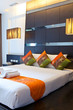 Hotel room with bed and wooden