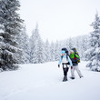 Hiker in the winter forest
