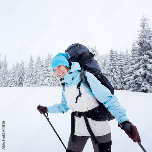 Photo: Hiker in the winter forest Hiker in the winter forest