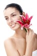 Pure young female face with lily