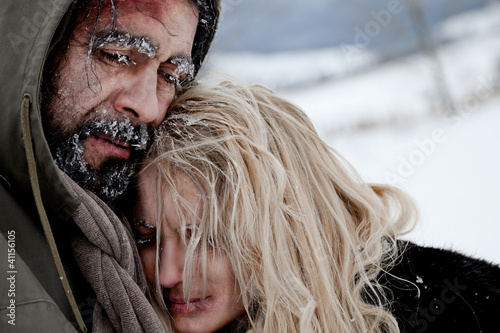 Photo: Freezing homeless couple hugging Freezing homeless couple hugging