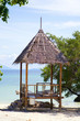 tropical beach with wooden bangalow tropical beach with wooden bangalow