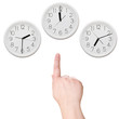 The office. Finger points to the clock
