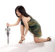 The girl in the studio with a sword