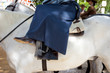Horse woman wearing the traditional spanish traje corto