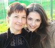 Portrait of happy beautiful mother and adult smiling daughter on Portrait of happy beautiful mother and adult smiling daughter on