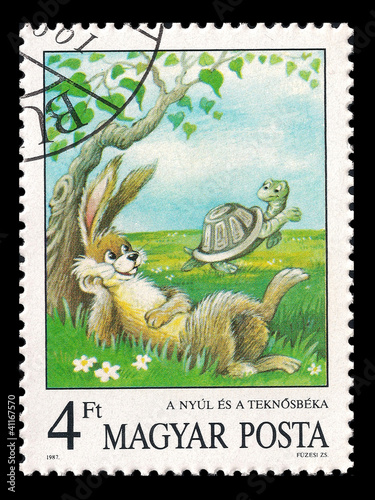 Photo: Slaked postage stamp in 1987 with a rabbit and a turtle Slaked postage stamp in 1987 with a rabbit and a turtle
