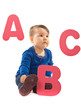 Baby with letters A,B,C over white Baby with letters A,B,C over white