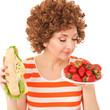 Fun woman with strawberry and sandwich on the white background Fun woman with strawberry and sandwich on the white background