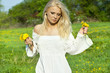 Photo: Beautiful sexy young woman outdoors, with flower Beautiful sexy young woman outdoors, with flower