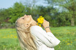 Photo: Beautiful sexy young woman outdoors, with flower Beautiful sexy young woman outdoors, with flower